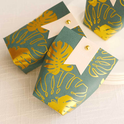 25 Pack Hunter Emerald Green Paper Pouch Candy Gift Bags With Gold Monstera Leaves Print Party Favor Boxes with Pin