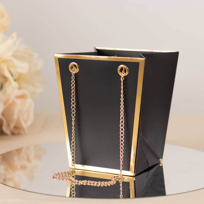 6 Pack Black Gold Edge Paper Flower Gift Bags With Metal Chain Handles Trapezoid Party Favor Tote Bags - 5’’x6’’