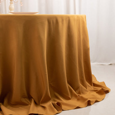 Premium Polyester 132’’ Round Tablecloth Gold - Seamless 220GSM Wrinkle-Resistant Design for Upscale Occasions