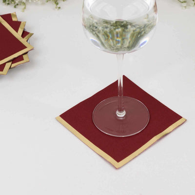 50-Pack Paper Beverage Napkins Burgundy with Gold Foil Edge - 2 Ply Disposable Soft 18GSM Cocktail Napkins 5’’x5’’