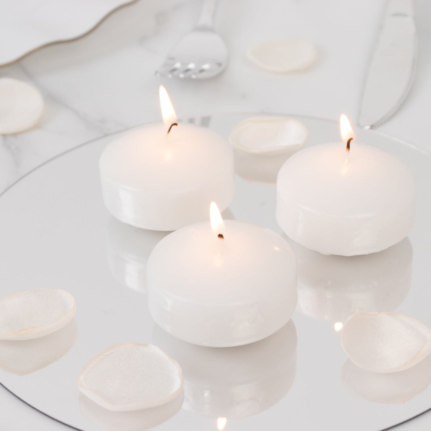 12 Pack 2" White Floating Candles â€“ Unscented Dripless Long-Lasting Disc Wax Candles for Weddings & Table DÃ©cor