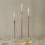 Gold Metal Taper Candle Holders with Hurricane Glass Shades, Set of 3 â€“ Modern Minimalist Candlestick Stands â€“ 28", 32", 36"