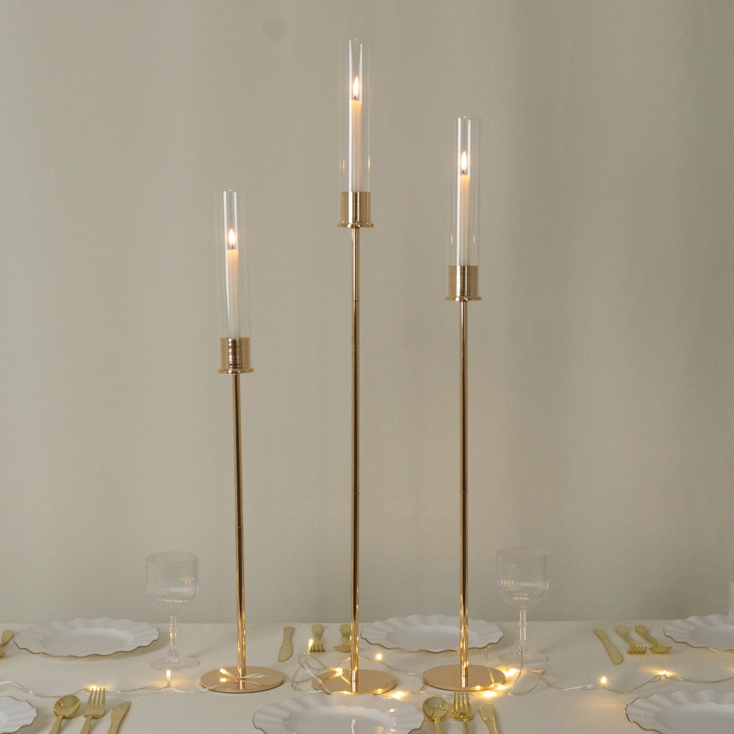 Gold Metal Taper Candle Holders with Hurricane Glass Shades, Set of 3 â€“ Modern Minimalist Candlestick Stands â€“ 28", 32", 36"