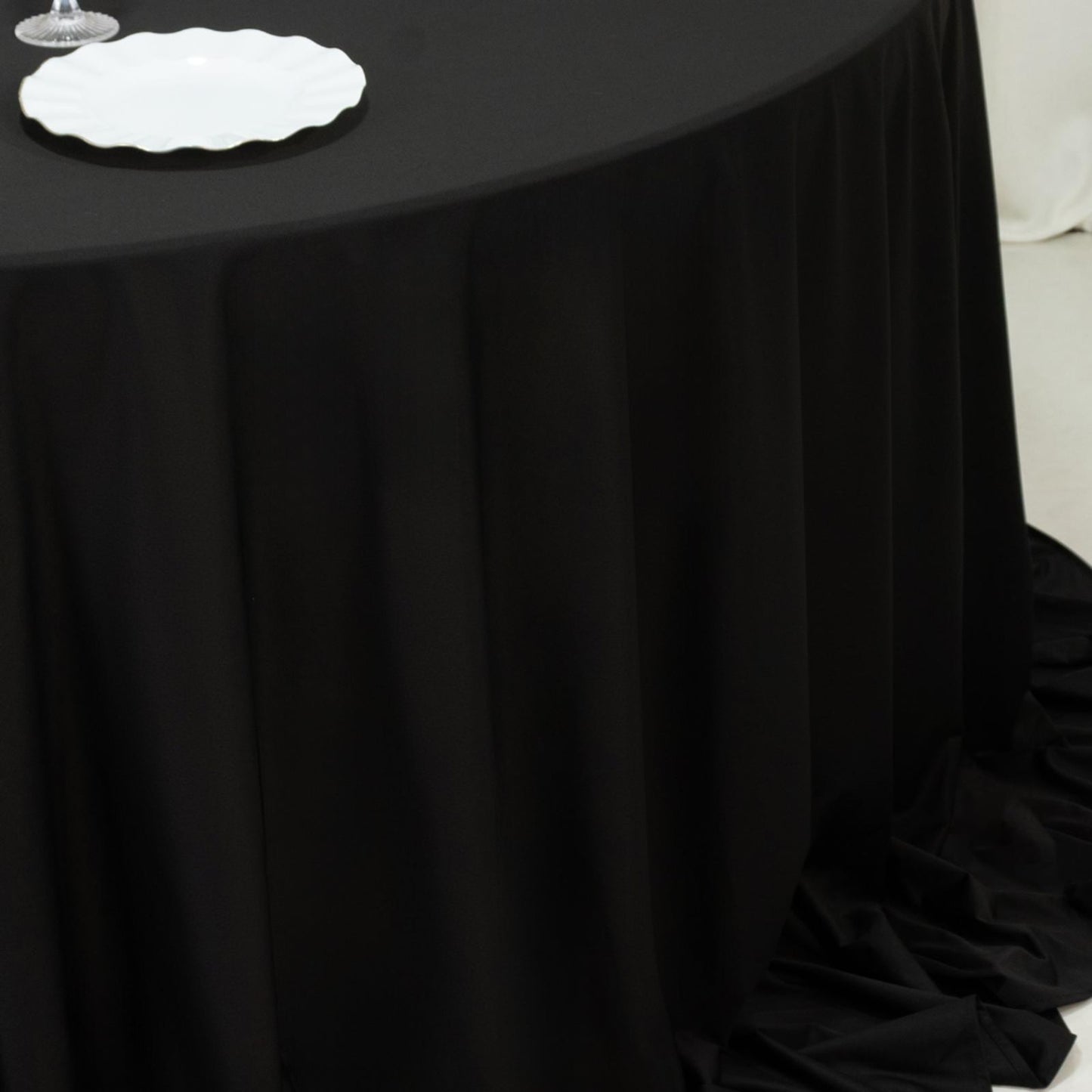 Fire Retardant Scuba Tablecloth â€“ 132" Round Black, Wrinkle Free, Stain Resistant, Seamless Polyester Cover