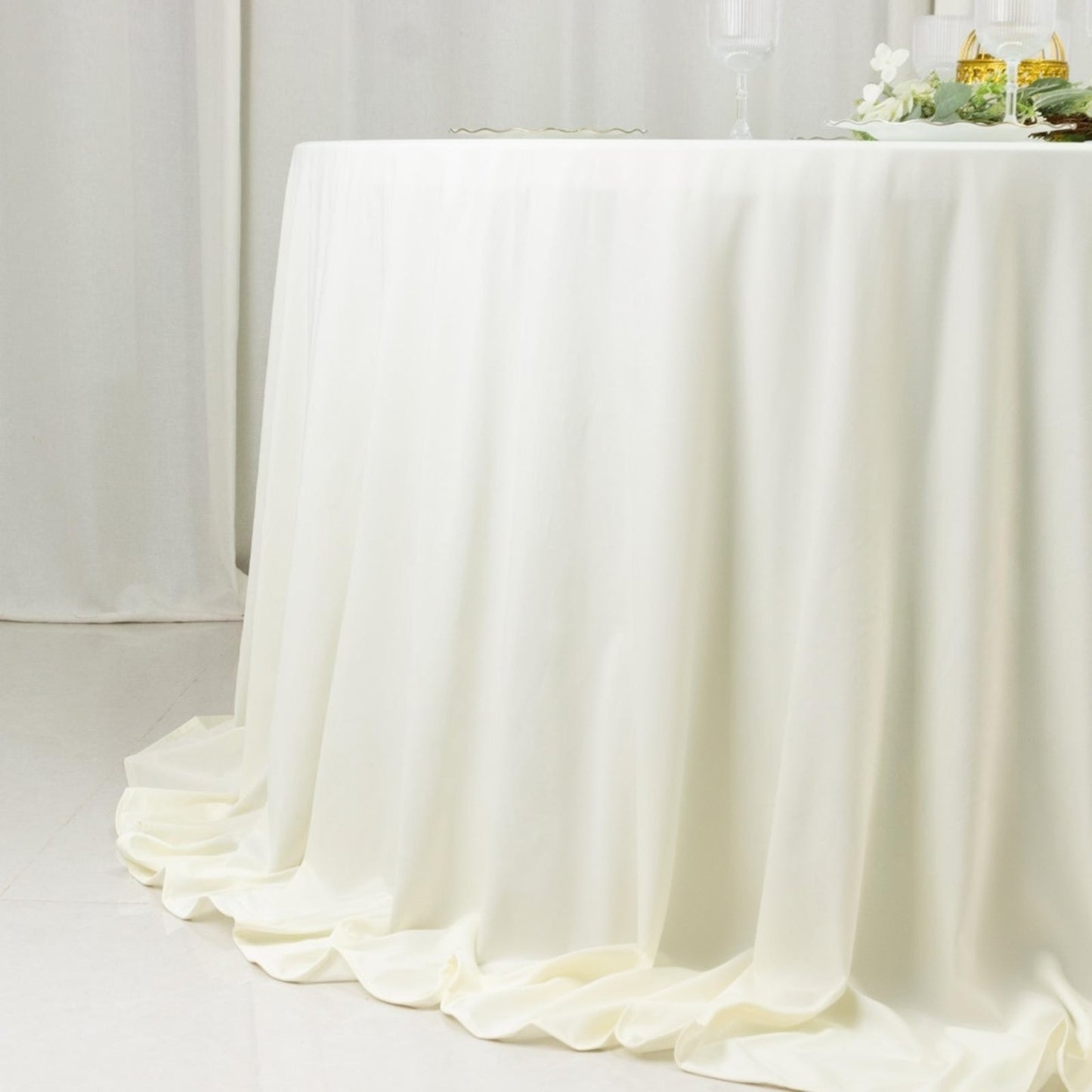 Fire Retardant Scuba Tablecloth â€“ 132" Round Ivory, Wrinkle Free, Stain Resistant, Seamless Polyester Cover