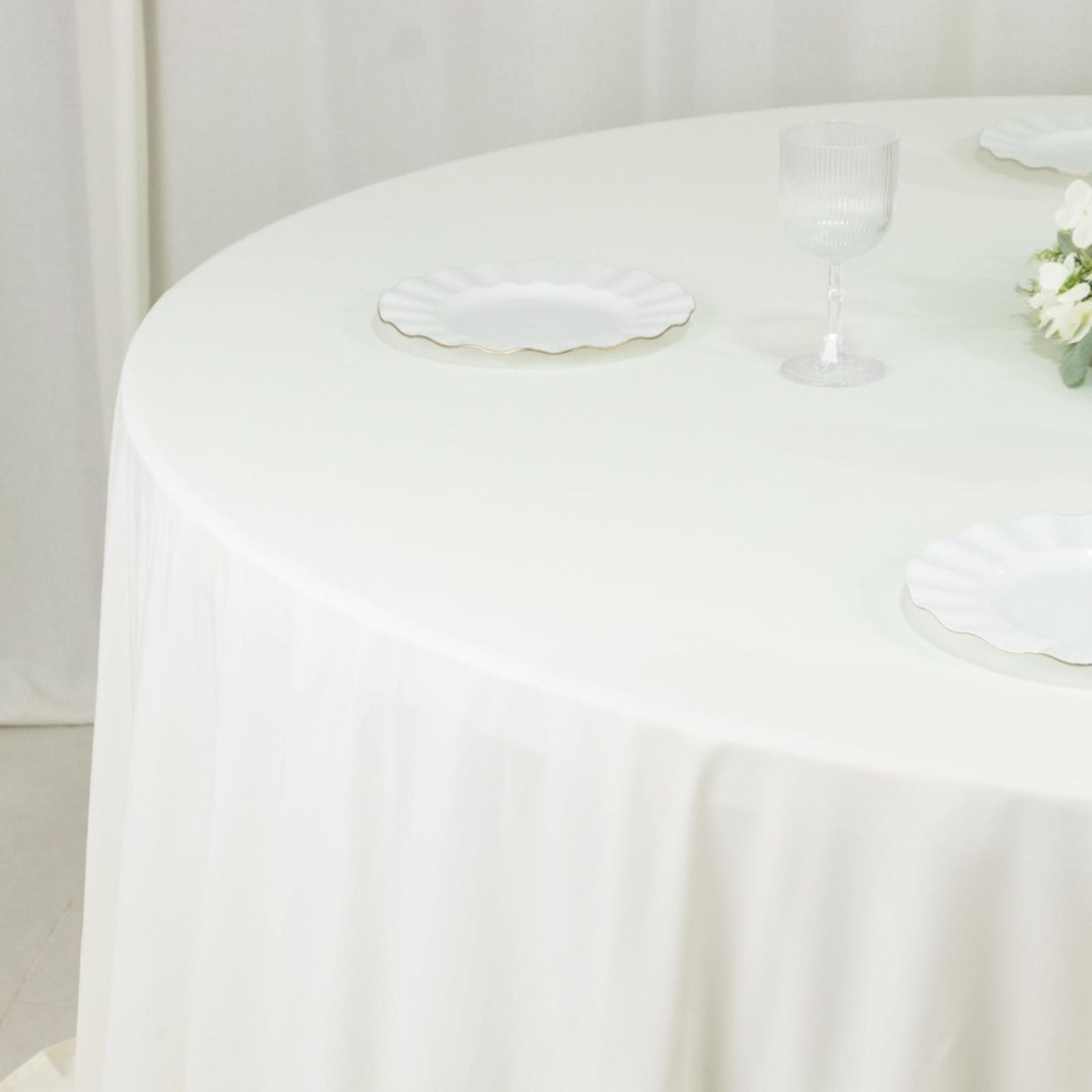 Fire Retardant Scuba Tablecloth â€“ 132" Round Ivory, Wrinkle Free, Stain Resistant, Seamless Polyester Cover