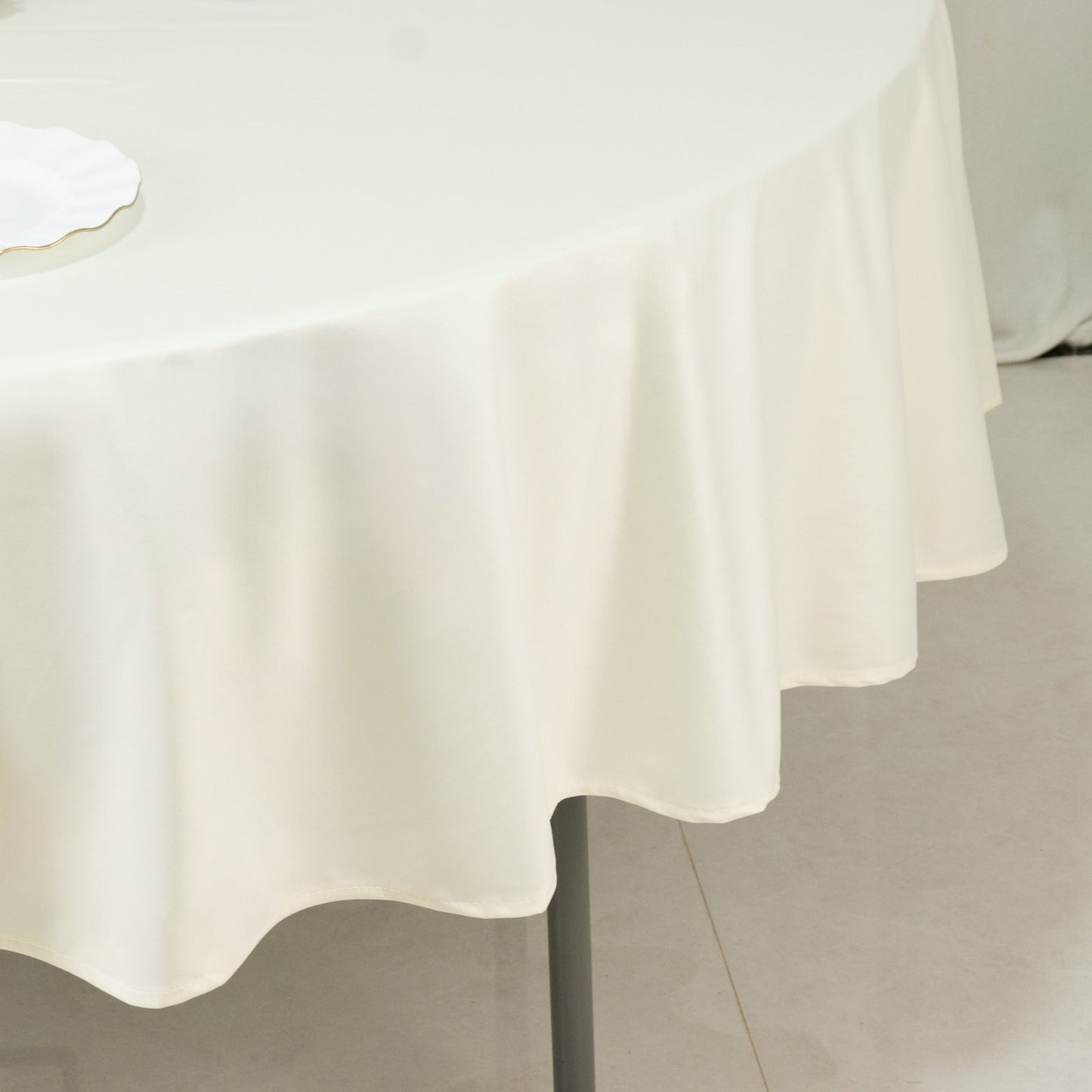 Fire Retardant Scuba Tablecloth â€“ 90" Round Ivory, Wrinkle Free, Stain Resistant Polyester Cover