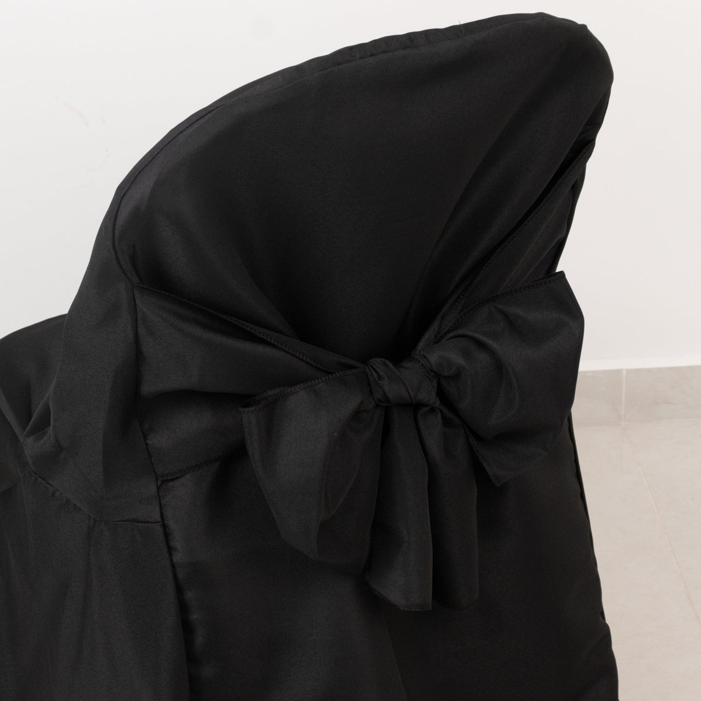 10-Pack Polyester Slip-On Folding Chair Covers with Attached Sashes â€“ Black Durable Reusable Covers for Wedding & Event Decor