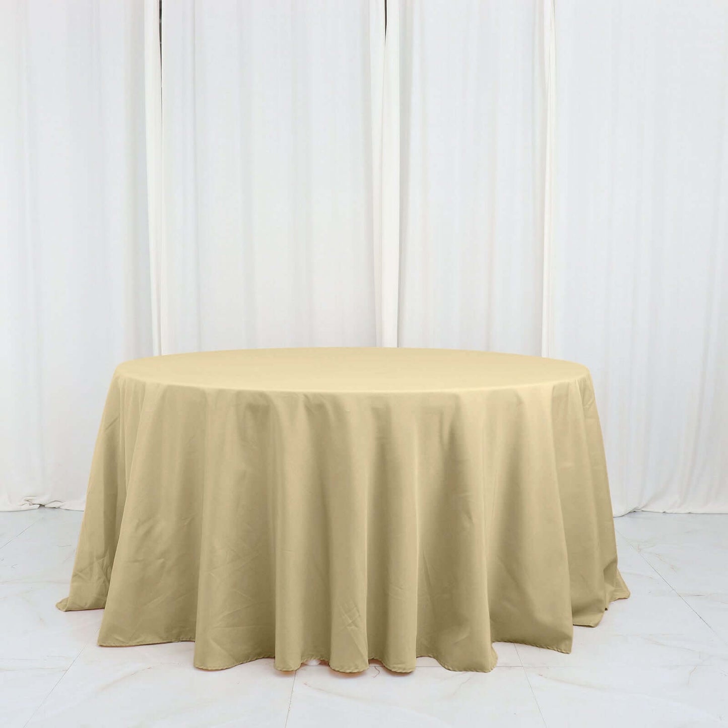Polyester 132" Round Tablecloth Champagne - Seamless Chic Table Cover