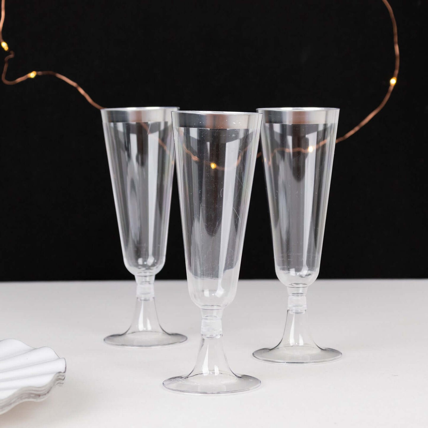 12-Pack Plastic Champagne Flutes Clear with Silver Rim - Stylish Disposable Cocktail Glasses for Parties 5oz 6"