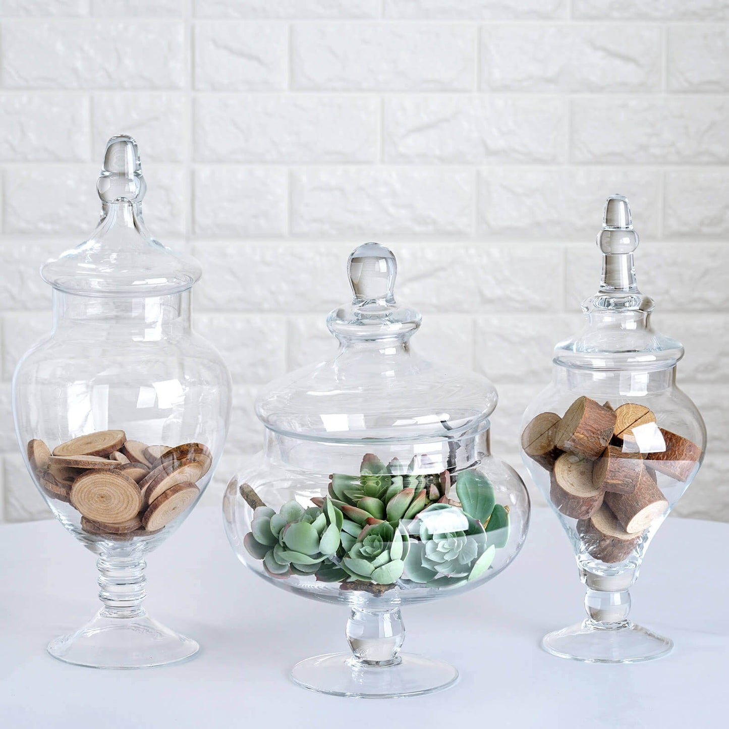 Set of 3 Glass Candy Jars Pedestal Apothecary Design Clear with Snap-On Lids - Stylish Party Favor Containers 10"/12"/14"