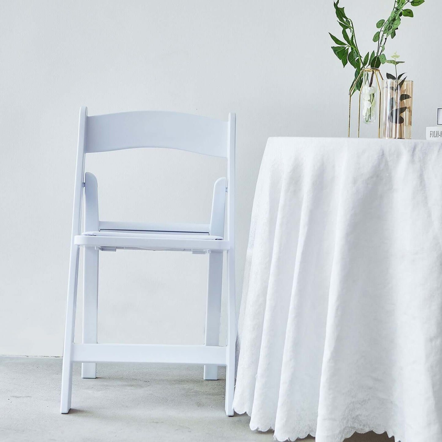 Resin Chair with Vinyl Padded Seat for Folding Use White - Stylish Design for Indoor or Outdoor Weddings & Gatherings