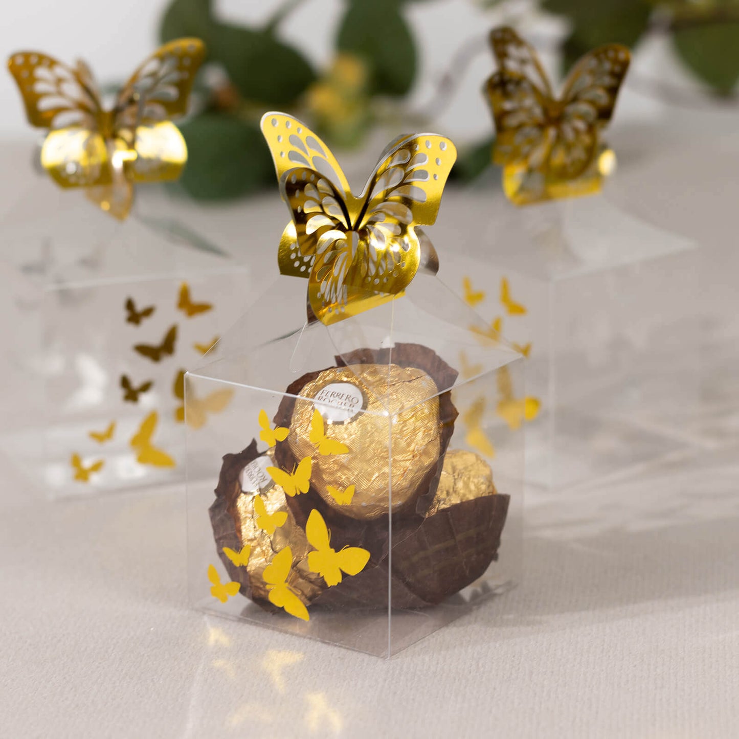 25 Pack Clear Transparent Square Party Favor Boxes with Gold Butterfly Top, Clear Candy Treat Gift Boxes - 2"x2"x4"
