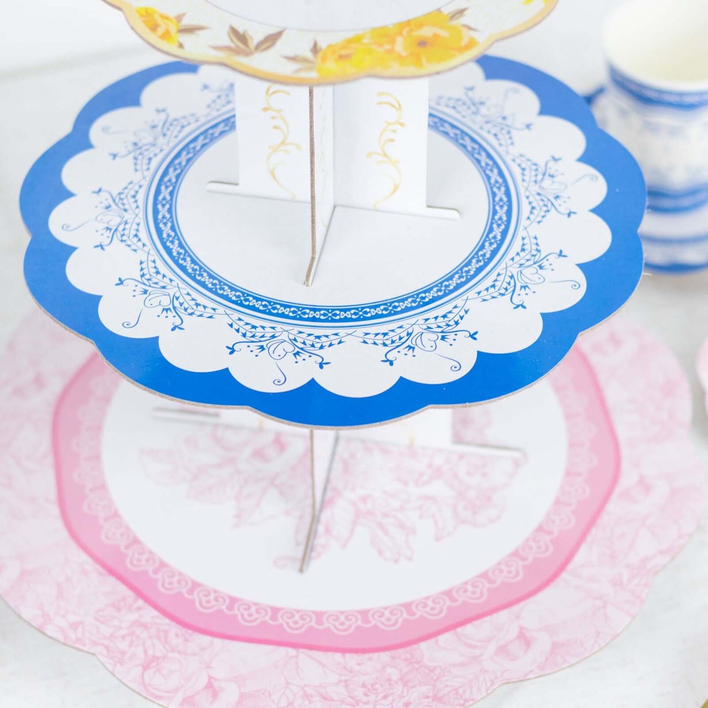 2-Pack Cardboard Round Cupcake Stand Assorted Floral Design - 3-Tier Reusable Dessert Display Pedestal With Scalloped Edges for Garden-Themed Celebrations 14"