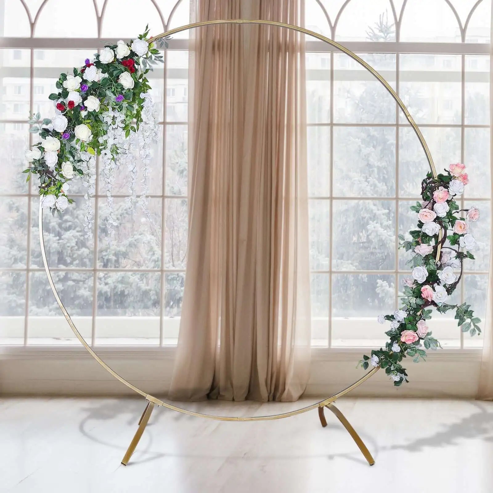 Gold hoop arch with floral decorations