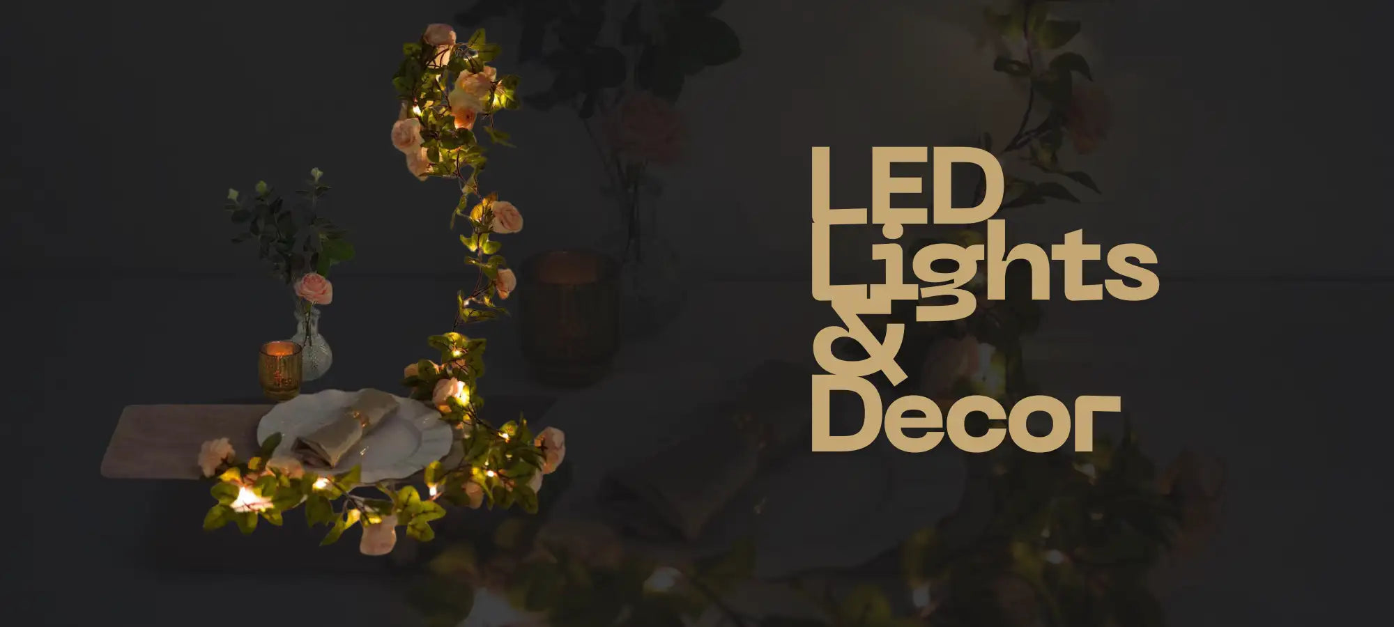 Golden led light garland with floral accents and warm glow.