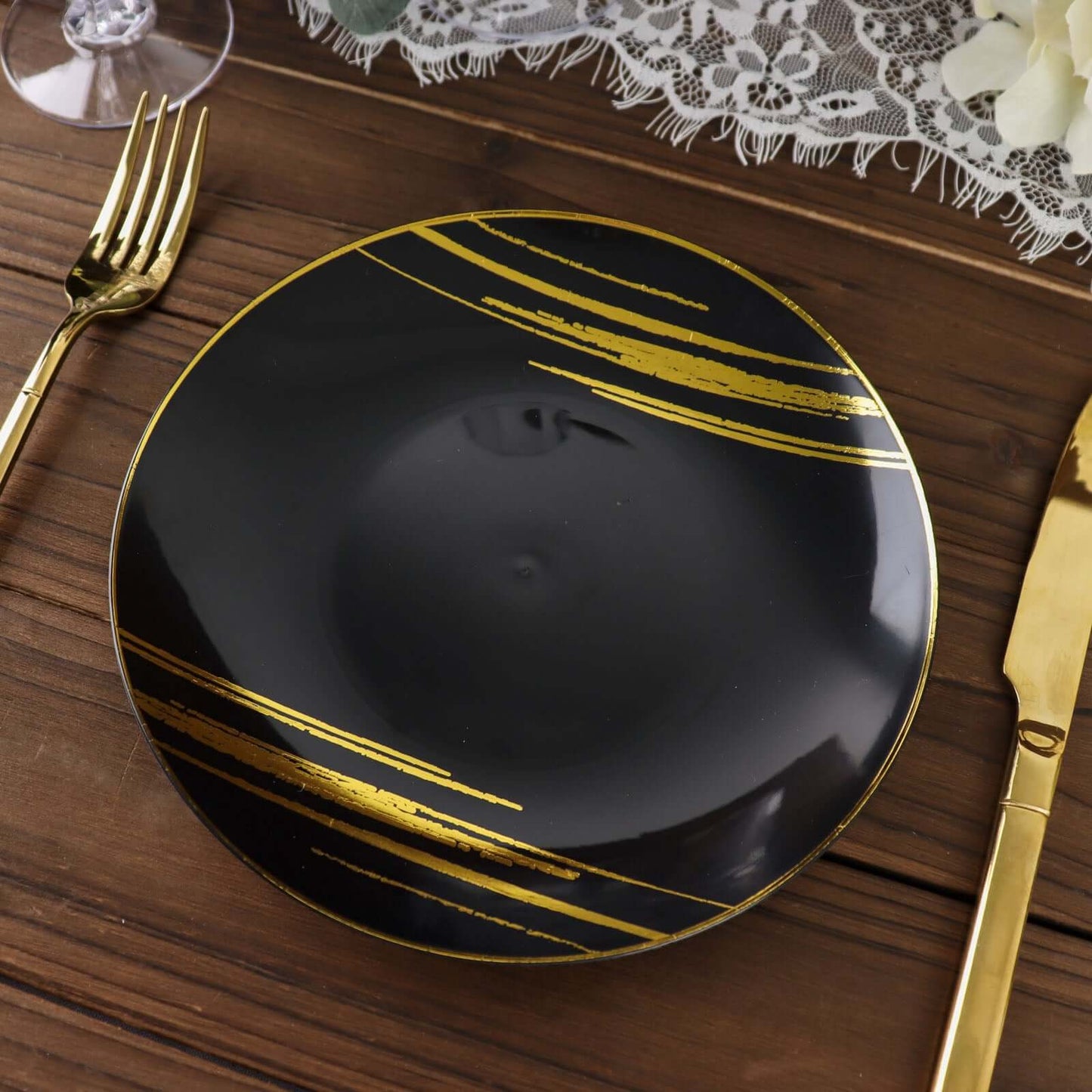 10-Pack Plastic 7" Round Dessert Plates in Black with Gold Brush Stroked Print - Disposable Appetizer Salad Plates for Modern Themed Events & Banquets