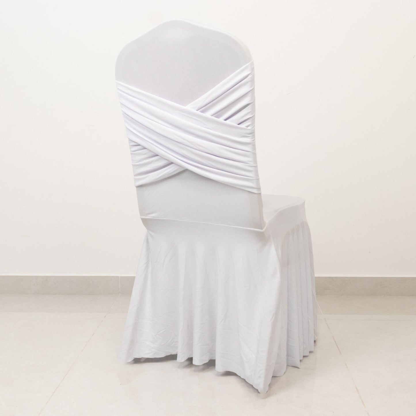 White Spandex Banquet Chair Cover with Ruffle Skirt & Cross Back Sash â€“ Stretch Slipcover for Events