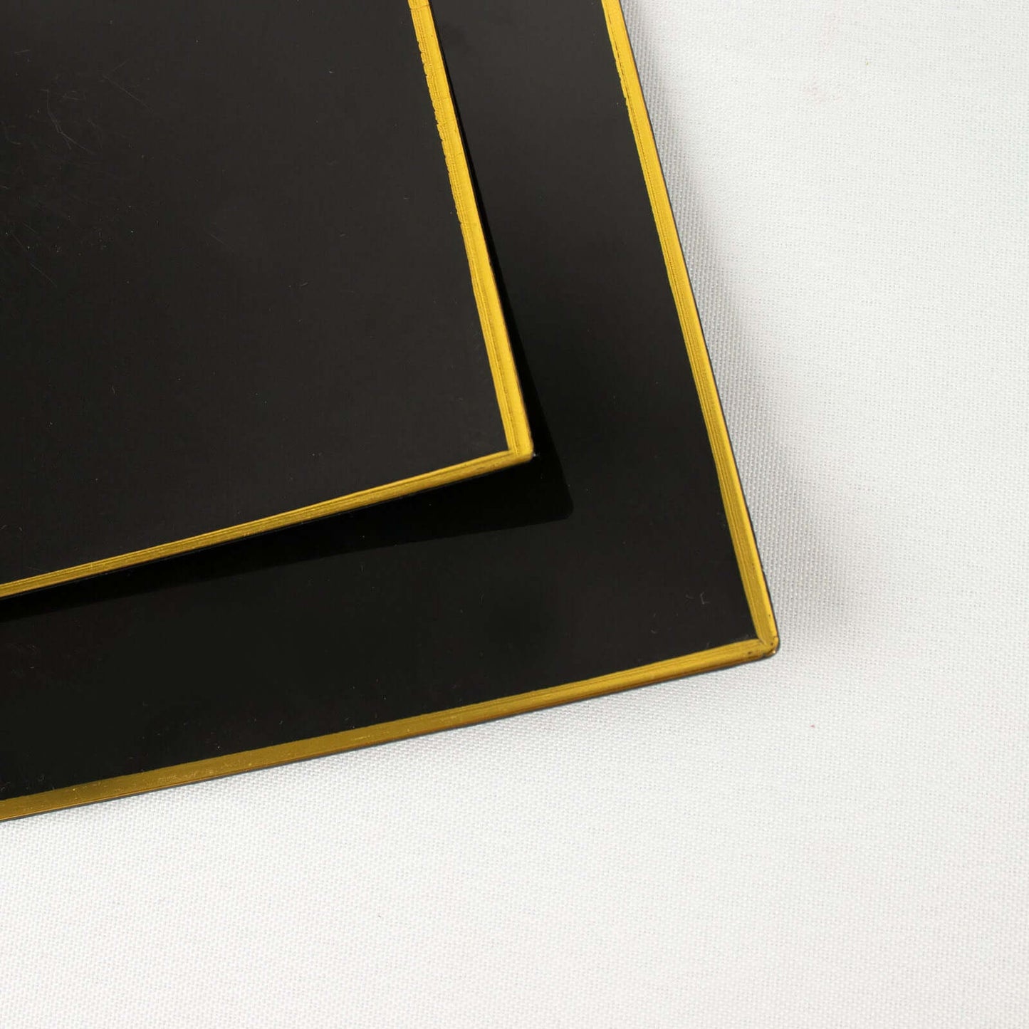 10-Pack Plastic 10" Square Dinner Plates in Black Concave Style with Gold Rim - Modern Disposable Party Plates