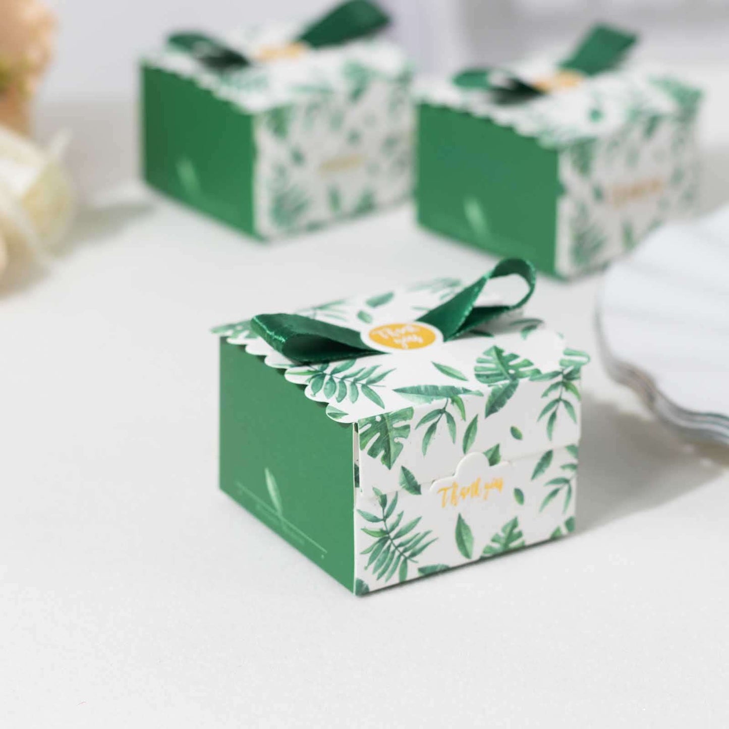 25 Pack Green Monstera Leaf Print Candy Gift Boxes with Satin Ribbon Bow, Thank You Cardstock Paper Party Favor Boxes - 2.5"x2.5"x2"