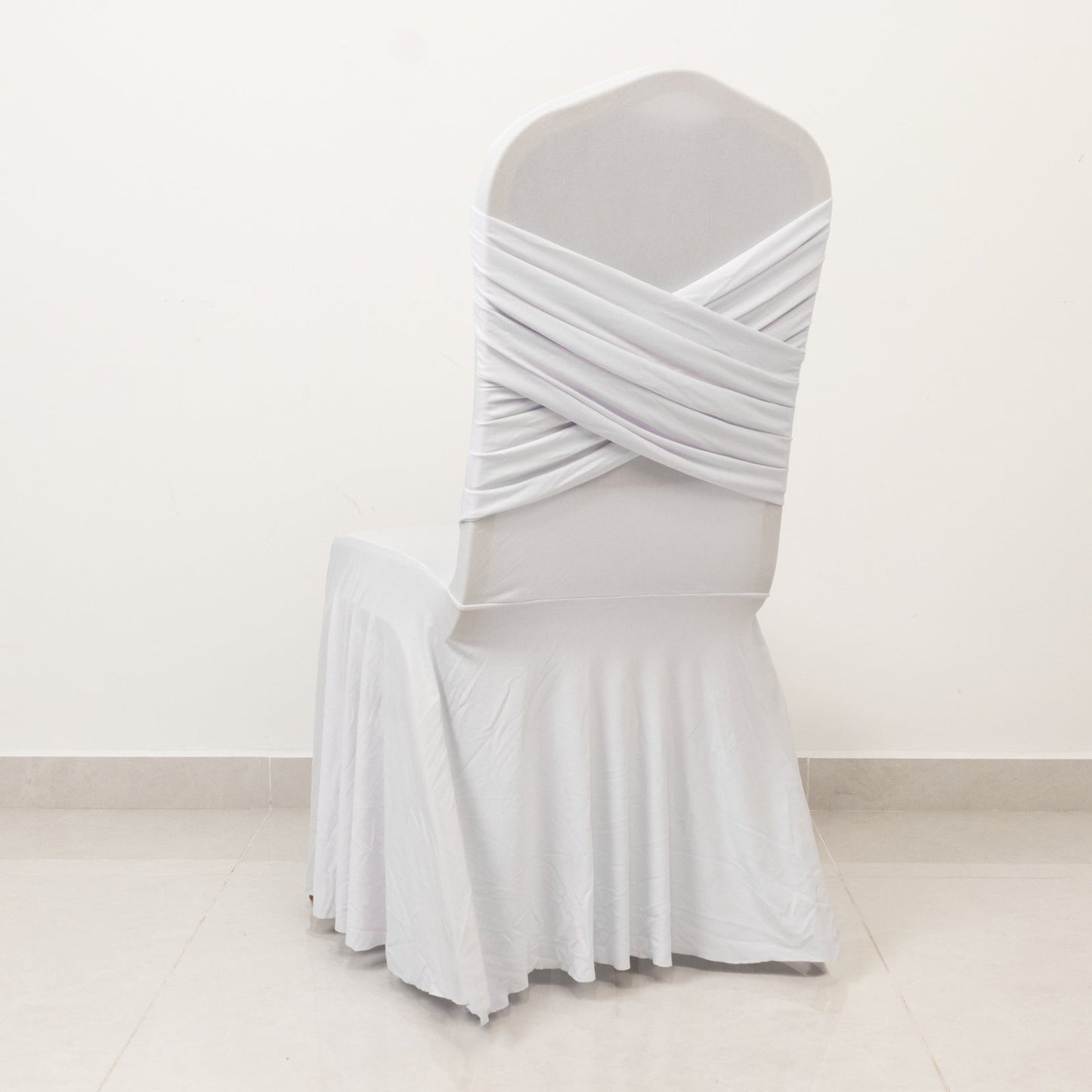 White Spandex Banquet Chair Cover with Ruffle Skirt & Cross Back Sash â€“ Stretch Slipcover for Events