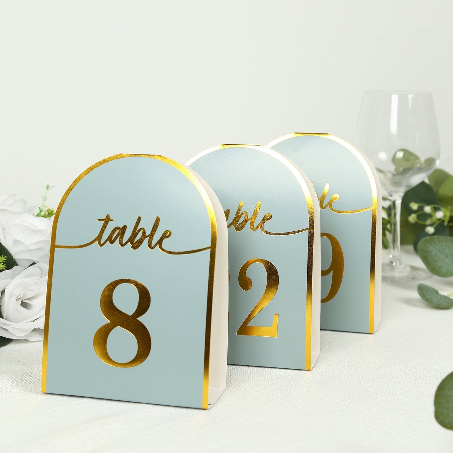 25-Pack 7" Disposable Table Numbers, Dusty Blue Free Standing Double Sided Table Number Place Cards with Metallic Gold Foil Numbers 1-25