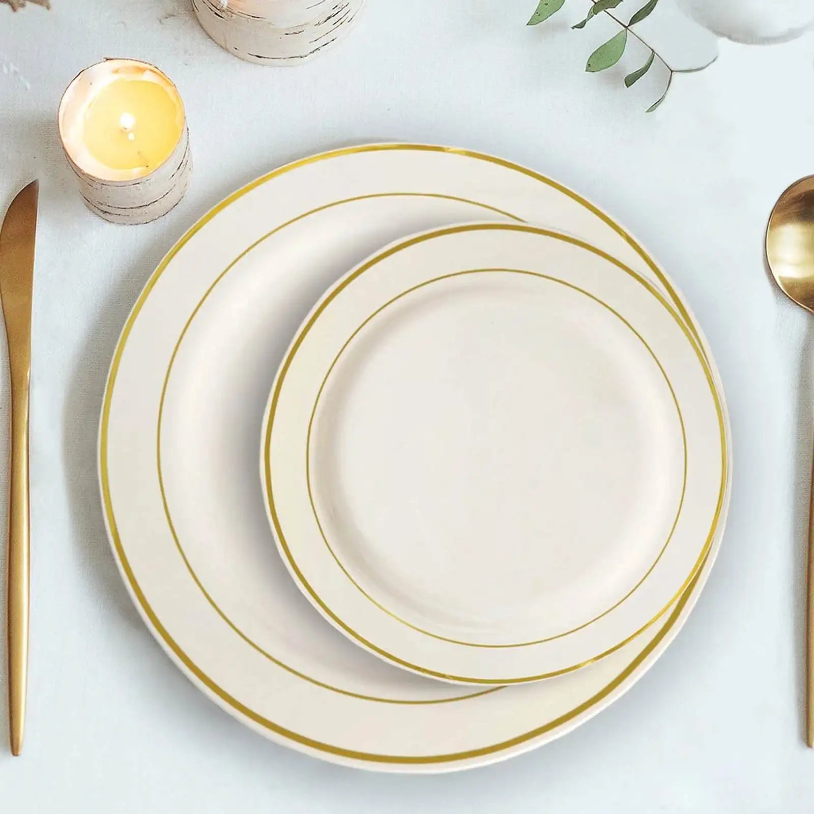 White porcelain dinnerware set with gold rim, elegant design suitable for formal dining.